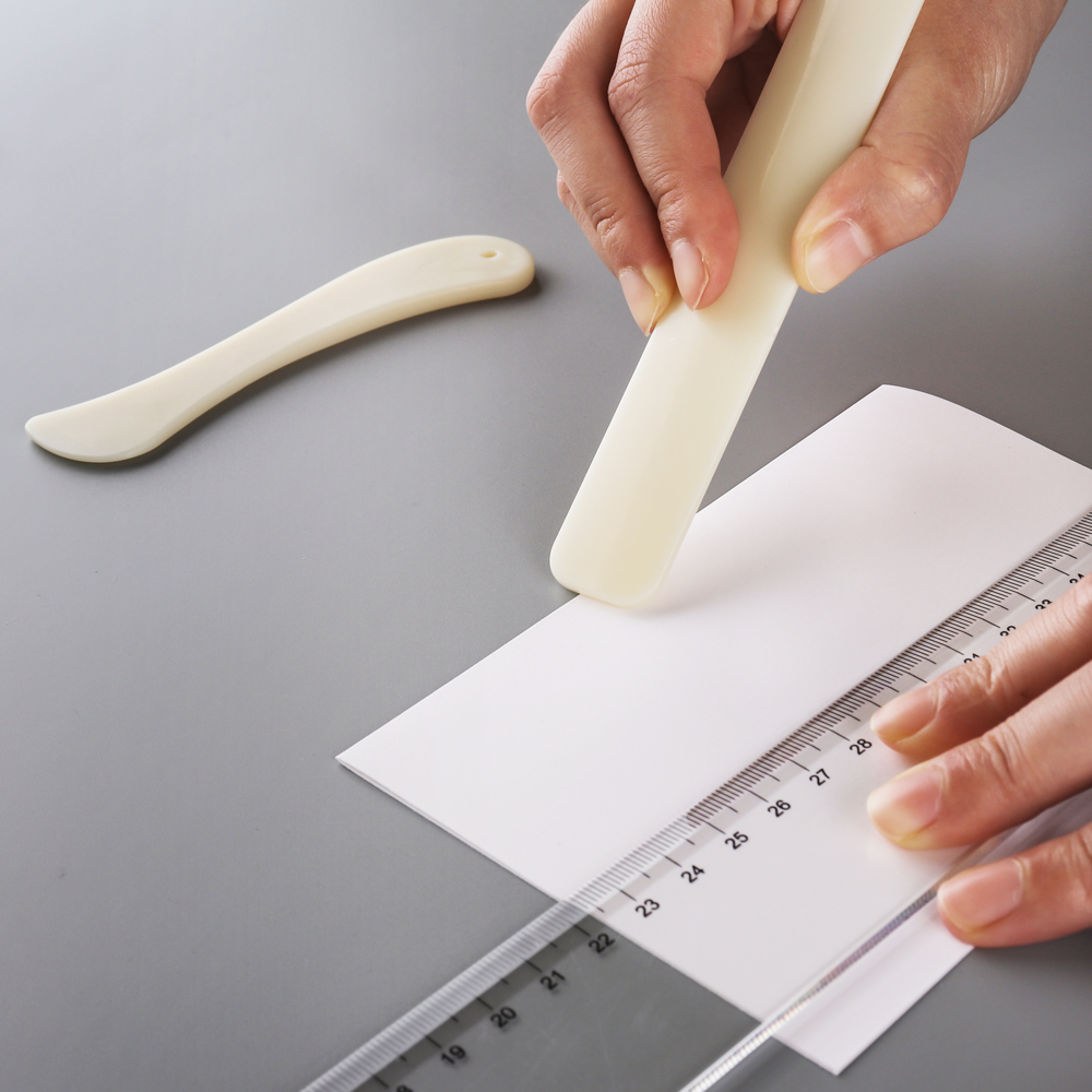 Piega di carta e cartella di o - Bone Folder Tool recensione e prezzo